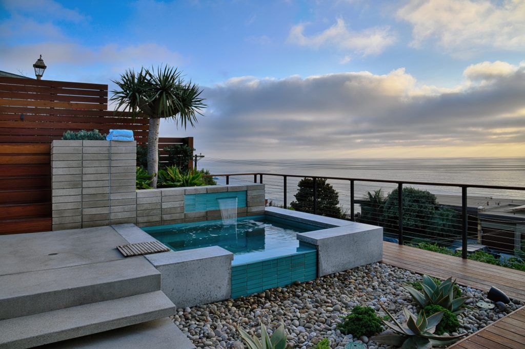 Trendy pool photo in San Diego