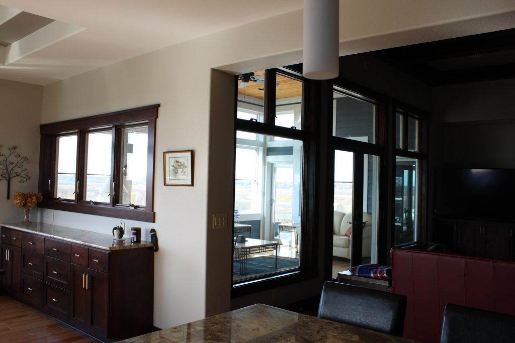 Trendy porch idea in Milwaukee by Homescapes Residential Design | Outdoor Photos | Porch | Landscaping | Landscape Design | Outdoor Living Space | Porch Design Ideas | Outdoor Living Space Ideas | Backyard Design