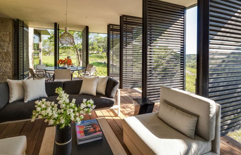 Trendy porch idea in New York with decking and a roof extension by Sara Story Design | Outdoor Photos | Porch | Landscaping | Landscape Design | Outdoor Living Space | Porch Design Ideas | Outdoor Living Space Ideas | Backyard Design