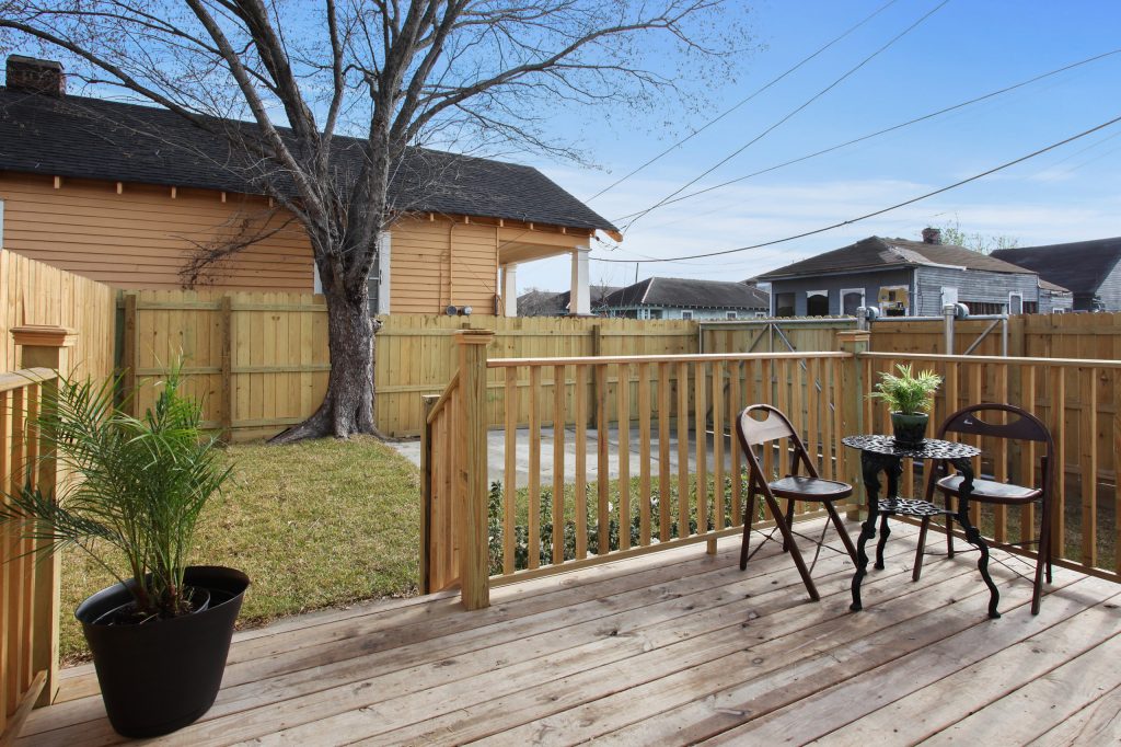 Trendy porch photo in New Orleans by Indior Consultants | Outdoor Photos | Porch | Landscaping | Landscape Design | Outdoor Living Space | Porch Design Ideas | Outdoor Living Space Ideas | Backyard Design