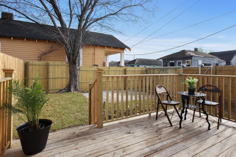 Trendy porch photo in New Orleans by Indior Consultants | Outdoor Photos | Porch | Landscaping | Landscape Design | Outdoor Living Space | Porch Design Ideas | Outdoor Living Space Ideas | Backyard Design