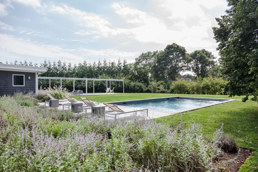 Trendy rectangular pool photo in New York