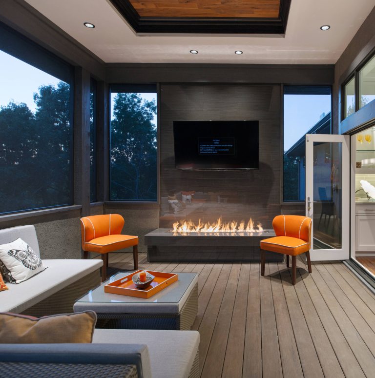 Trendy screened-in porch idea in Kansas City with decking and a roof extension by Pam Baker & Associates | Outdoor Photos | Porch | Landscaping | Landscape Design | Outdoor Living Space | Porch Design Ideas | Outdoor Living Space Ideas | Backyard Design