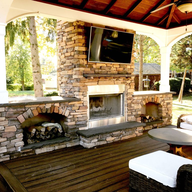 Trex Deck with pavilion, Napoleon wood burning fireplace and Twin Eagles outdoor kitchen.