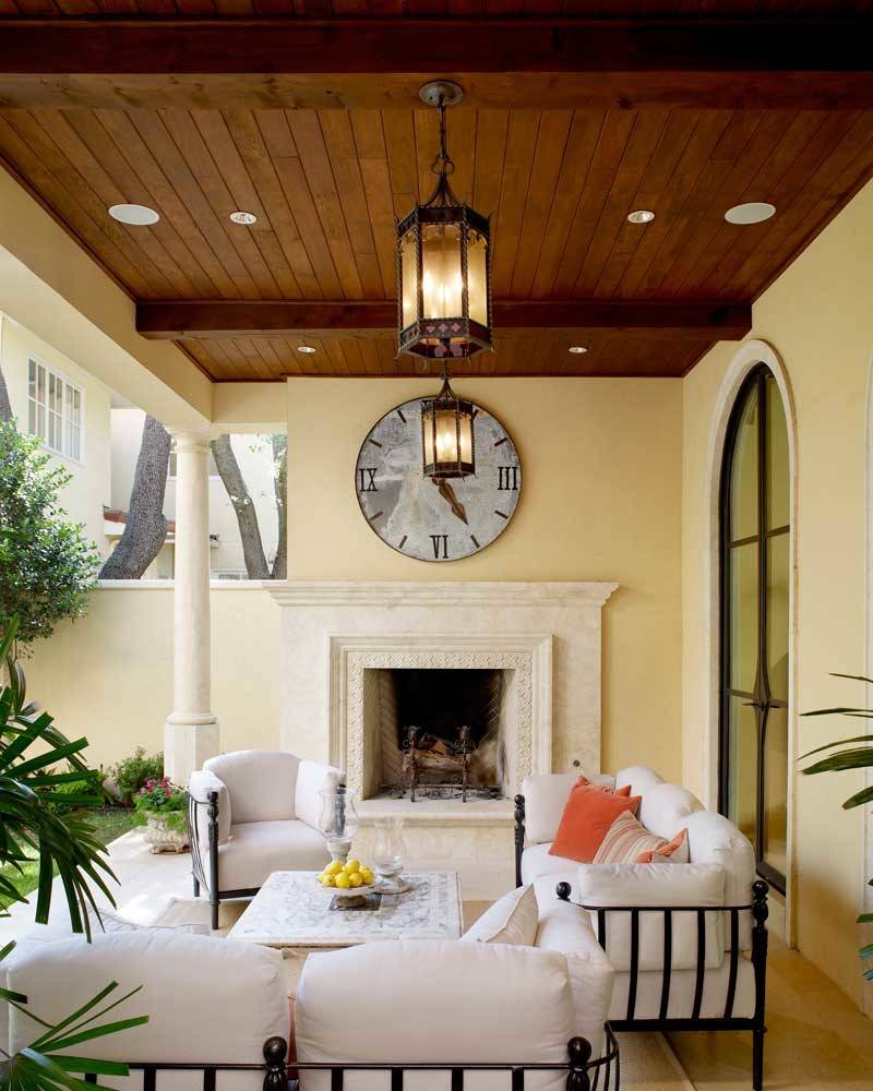 Tuscan back porch photo in Dallas with a fireplace and a roof extension by Ventura Custom Homes | Outdoor Photos | Porch | Landscaping | Landscape Design | Outdoor Living Space | Porch Design Ideas | Outdoor Living Space Ideas | Backyard Design