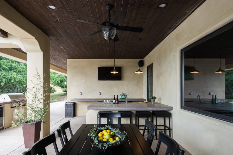 Tuscan concrete back porch photo in San Luis Obispo with a roof extension by Coast Construction | Outdoor Photos | Porch | Landscaping | Landscape Design | Outdoor Living Space | Porch Design Ideas | Outdoor Living Space Ideas | Backyard Design