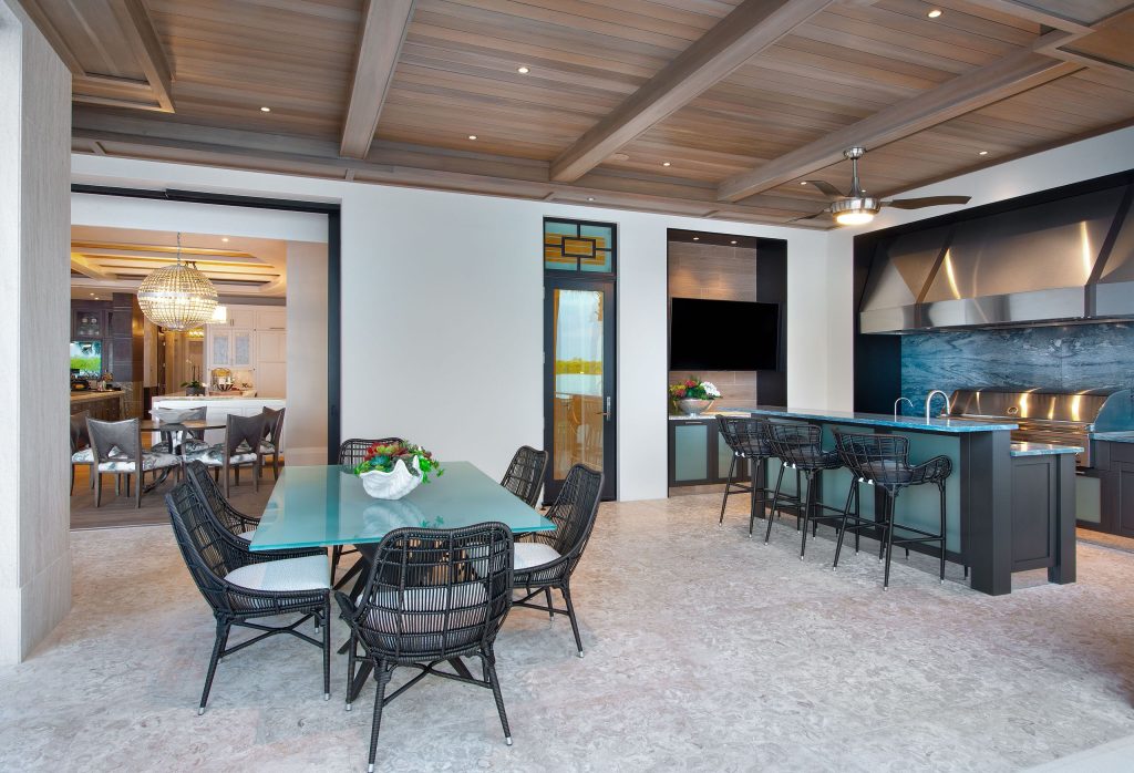 Tuscan outdoor kitchen porch photo in Miami with a roof extension by Kukk Architecture & Design P.A. | Outdoor Photos | Porch | Landscaping | Landscape Design | Outdoor Living Space | Porch Design Ideas | Outdoor Living Space Ideas | Backyard Design