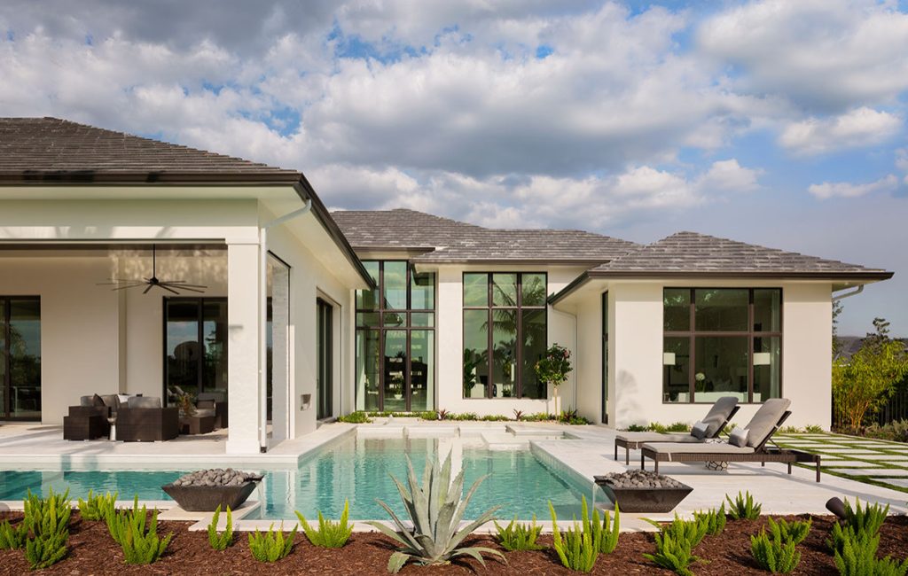 Tuscan pool photo in Miami