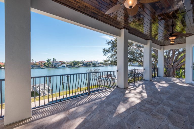 Tuscan porch idea in Tampa by Carval Custom Homes | Outdoor Photos | Porch | Landscaping | Landscape Design | Outdoor Living Space | Porch Design Ideas | Outdoor Living Space Ideas | Backyard Design