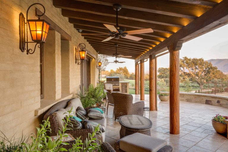 Tuscan porch photo in Santa Barbara with a roof extension by Mitch Williams Construction, Inc. | Outdoor Photos | Porch | Landscaping | Landscape Design | Outdoor Living Space | Porch Design Ideas | Outdoor Living Space Ideas | Backyard Design