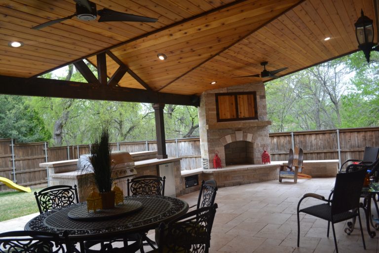 Two-toned mini gable patio cover with full kitchen and fireplace