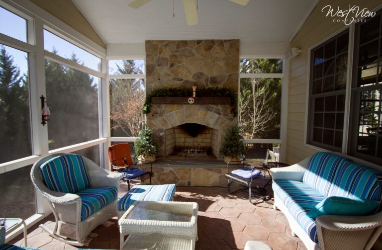 Upper level, interior, covered area for the double sided fireplace with direct access from the house.