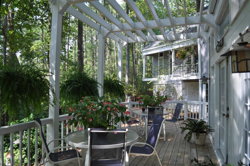 View from the deck to the balcony off the master bedroom.