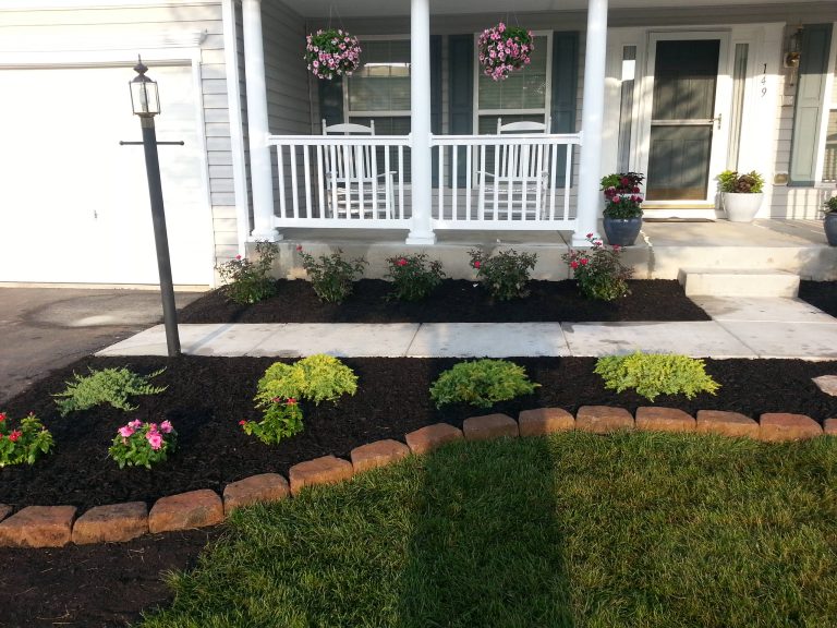 Walkersville, Maryland homeowner sent us the picture of the porch we built after he added landscaping.