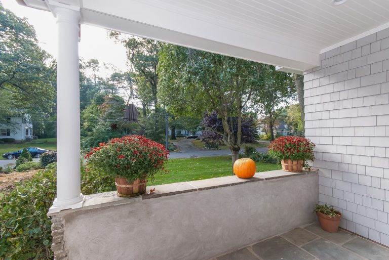 Wave hello to your neighbors while enjoying the front of this fantastic home.