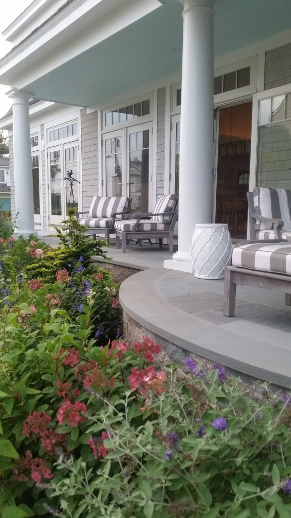 We also added stone steps and plantings around the porch area.