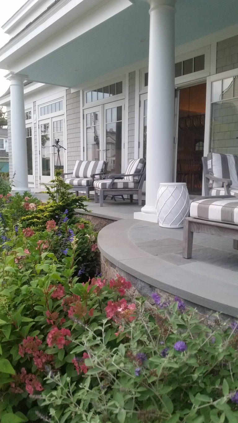 We also added stone steps and plantings around the porch area.