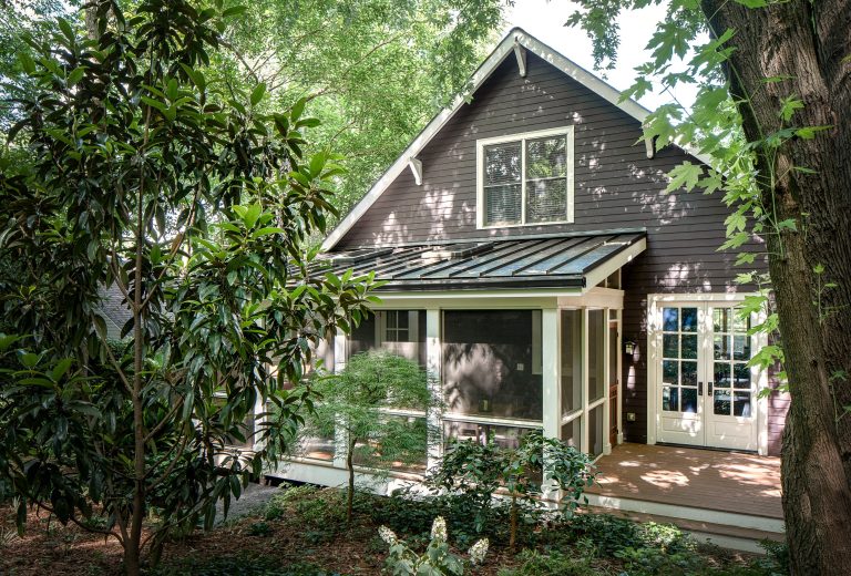 We installed a metal roof onto the back porch to match the home's gorgeous exterior.