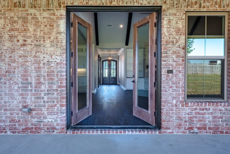 We love this view from the back patio to the front entrance. Photo Credit: Mallory Jeffers Photography
