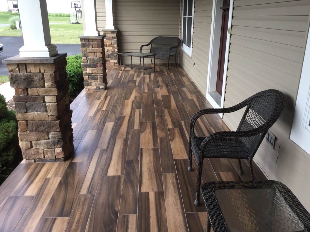 We used a wood look tile to enhance the entry to this home. Daltile Acacia Valley porcelain tile.