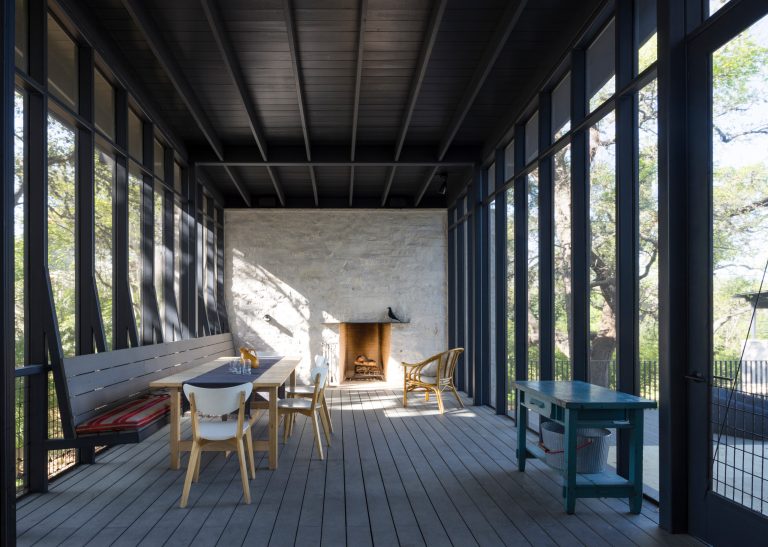 Whit Preston photographer. Limestone fireplace wall. Paint color of ceiling: Benjamin Moore, Racoon Fur.