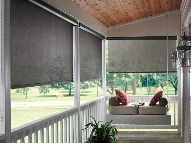 With roller shades and a beautiful porch swing, you'll be hard pressed to find a reason to ever go inside.