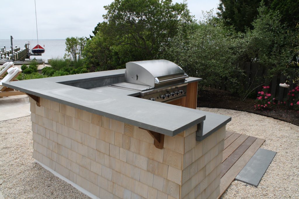 Wooden outdoor kitchen with Blue stone counter