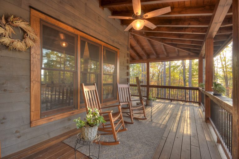 Wrap around porch on "First Home" floor plan. Beamed porch roof, with tongue and groove ceiling.