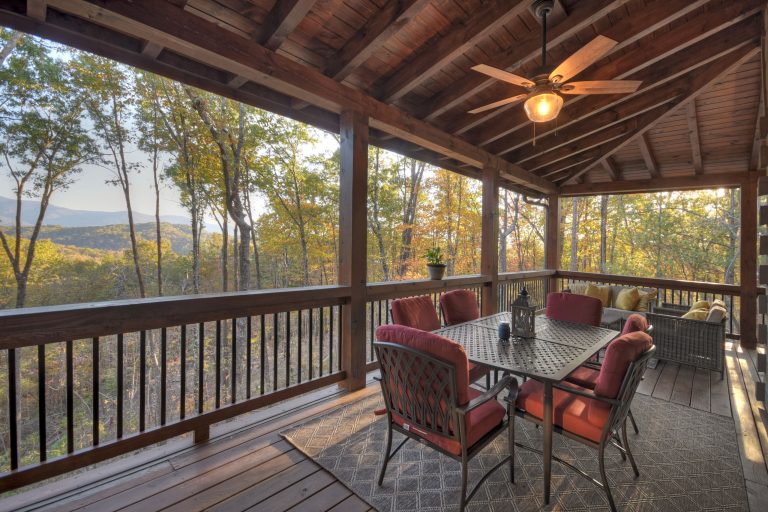 Wrap around porch on "First Home" floor plan. Beamed porch roof, with tongue and groove ceiling.