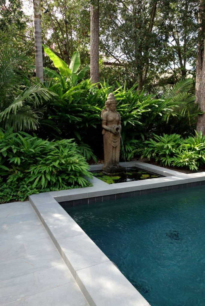 Zen rectangular pool photo in Houston