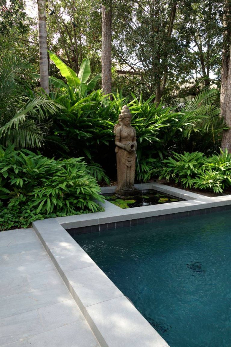 Zen rectangular pool photo in Houston