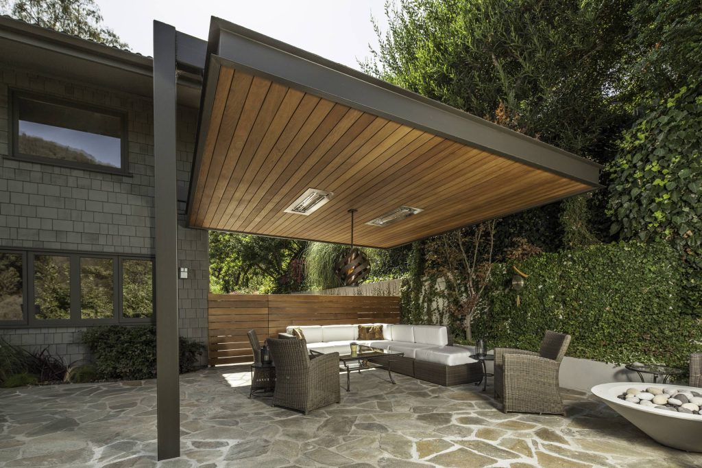 Patio - contemporary patio idea in Los Angeles with a fire pit
