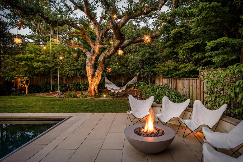 Tuscan backyard patio photo in San Francisco with a fire pit and no cover