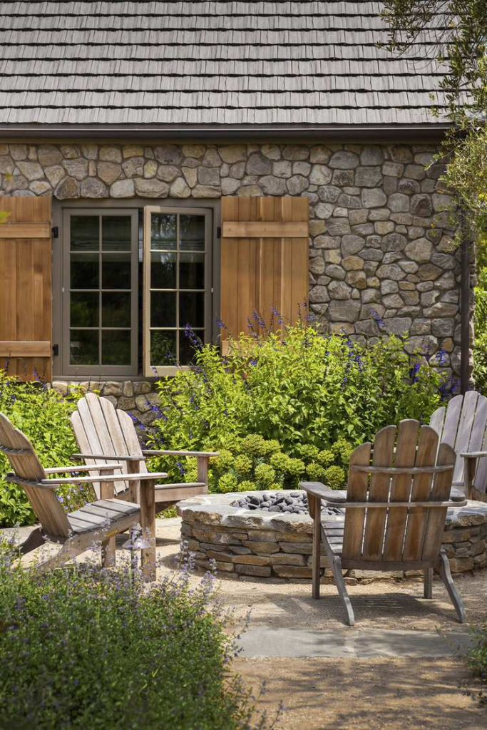 Inspiration for a timeless patio remodel in Los Angeles with a fire pit and no cover