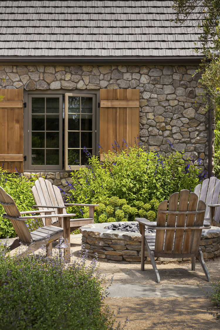 Inspiration for a timeless patio remodel in Los Angeles with a fire pit and no cover