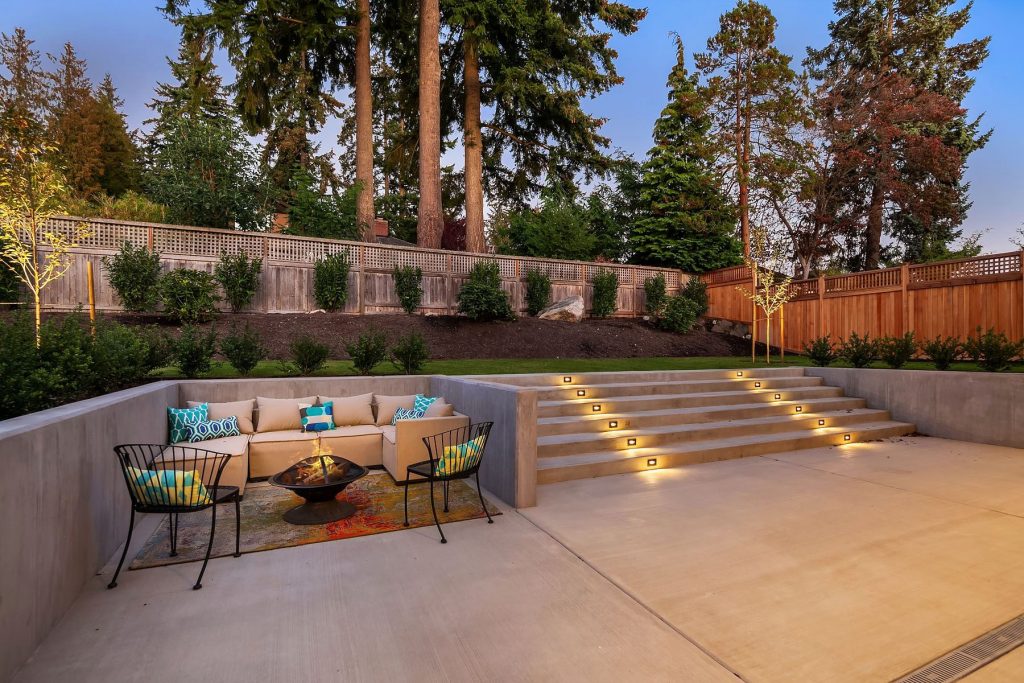 Patio - contemporary patio idea in Seattle with a fire pit and no cover