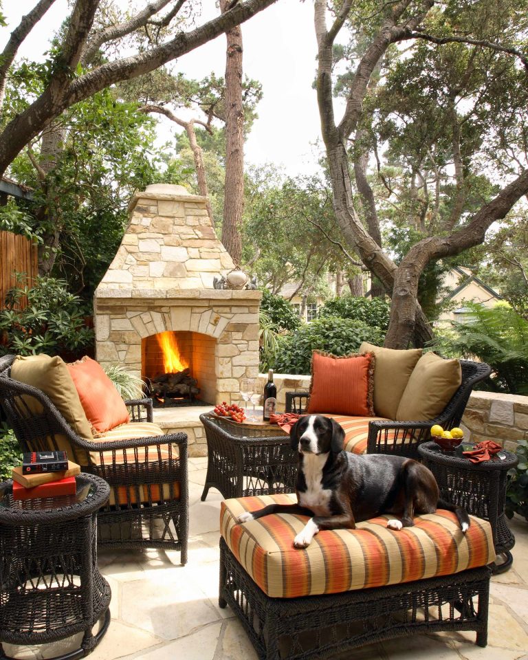Inspiration for a mid-sized timeless backyard stone patio remodel in San Francisco with a fire pit and no cover