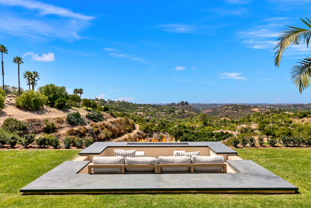 Patio - contemporary patio idea in San Diego with a fire pit