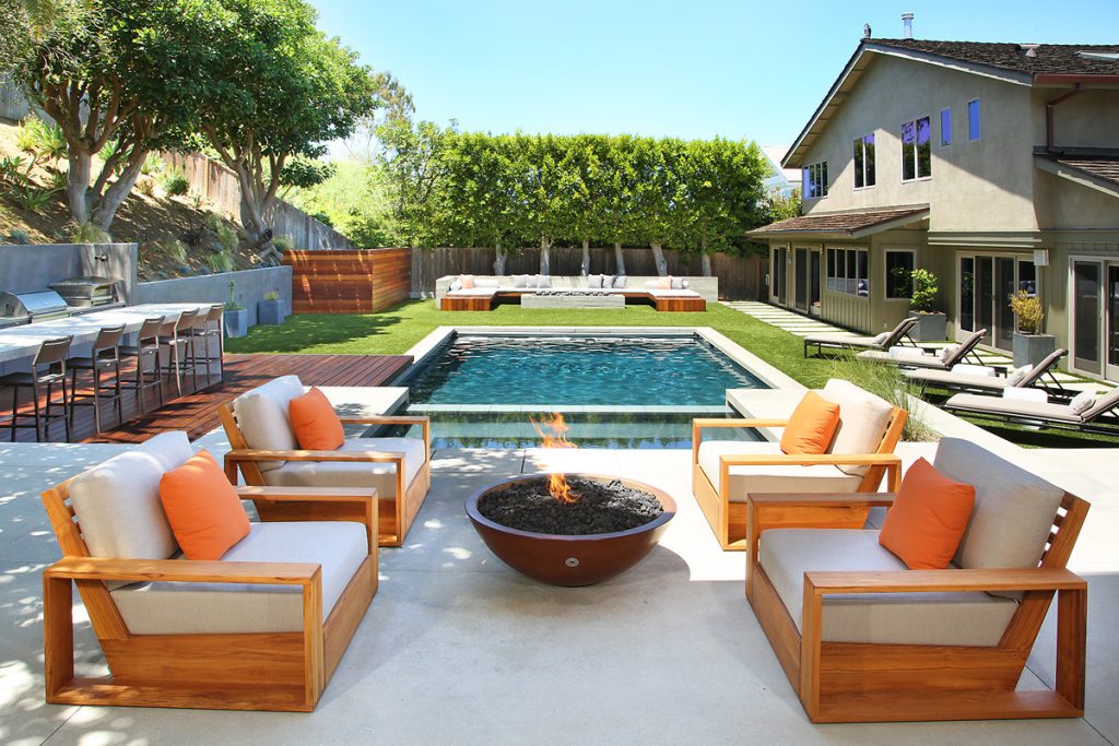 Patio - contemporary patio idea in Orange County with a fire pit and no cover