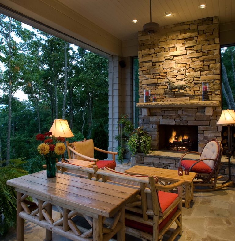 Wonderful outdoor living space, motorized Phantom screens open up to incredible mountain view. Woodburning masonry fireplace with real stacked stone veneer, stone mantle by BlueStone Construction, LLC | Outdoor Photos | Porch | Landscaping | Landscape Design | Outdoor Living Space | Porch Design Ideas | Outdoor Living Space Ideas | Backyard Design
