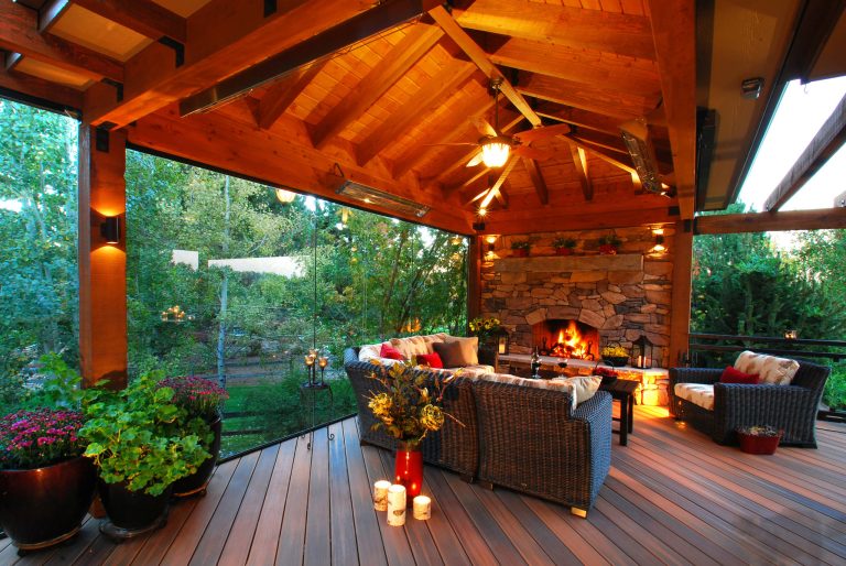 A glass wall combined with outdoor heaters, fire place and cover allow for year-round use.