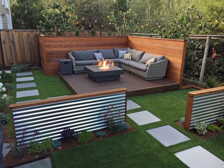Example of a small trendy backyard deck design in San Francisco with a fire pit