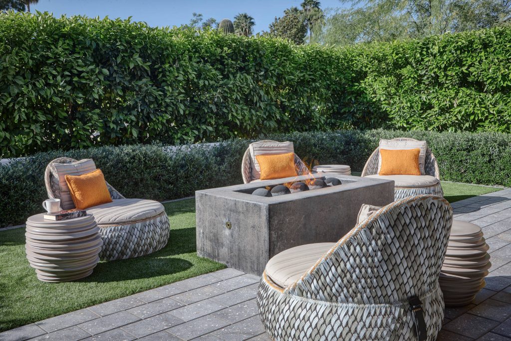 Patio - contemporary patio idea in Phoenix with a fire pit and no cover