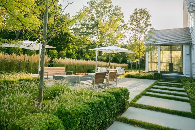 Inspiration for a contemporary backyard tile patio remodel in Chicago with a fire pit and no cover