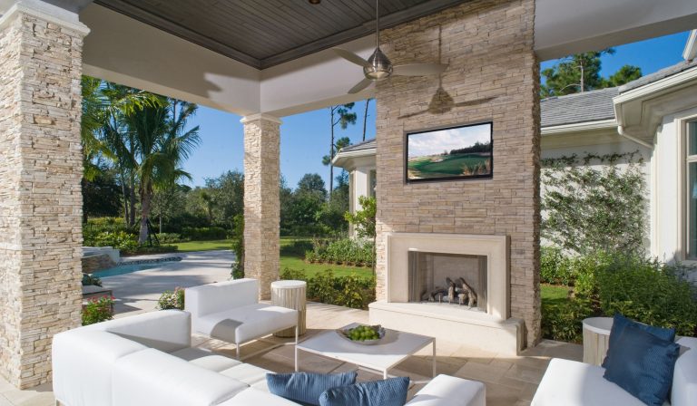 Inspiration for a transitional backyard patio remodel in San Diego with a fire pit and a roof extension