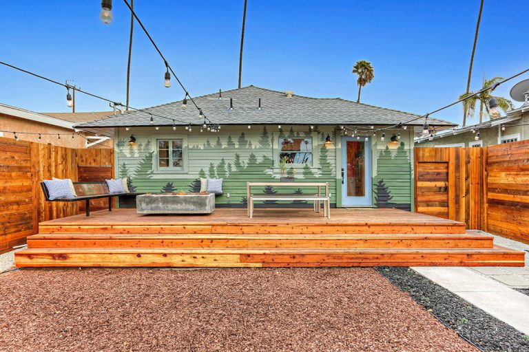 Deck - craftsman backyard deck idea in Los Angeles with a fire pit and no cover