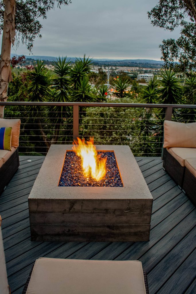 Project completed. For this client we designed and built a new deck with a built-in Spa, custom concrete fire pit, stainless steel cablerail and lighting. Design Build by PacifiCoastal Design and Construction 2019.