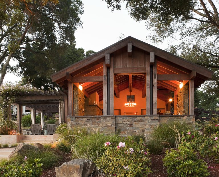 Patio - mid-sized mediterranean backyard stone patio idea in San Francisco with a fire pit and a pergola