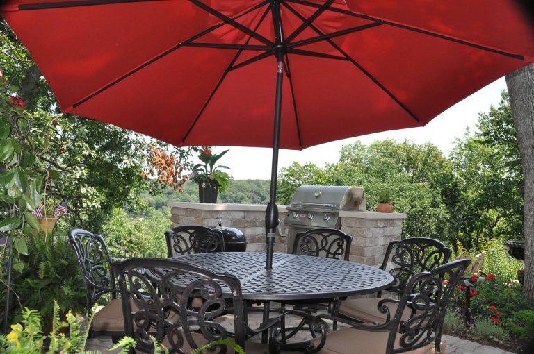 fire feature, retaining wall, annual flower pots, existing stone wall