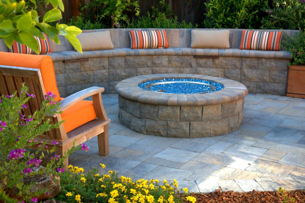 Small transitional backyard concrete paver patio photo in San Francisco with a fire pit and no cover